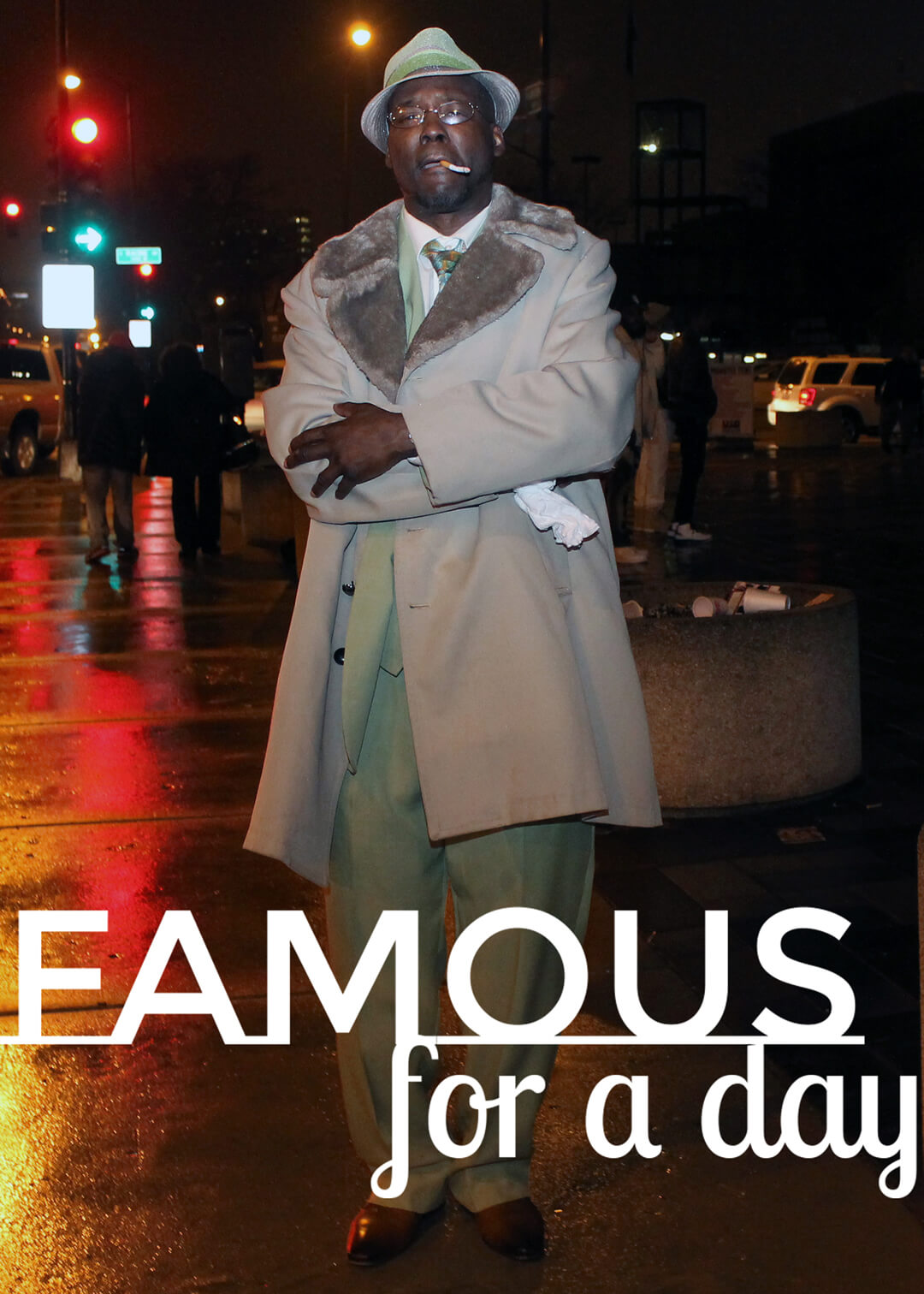 Man in a vintage-style suit standing confidently on a wet city street at night under bright lights
